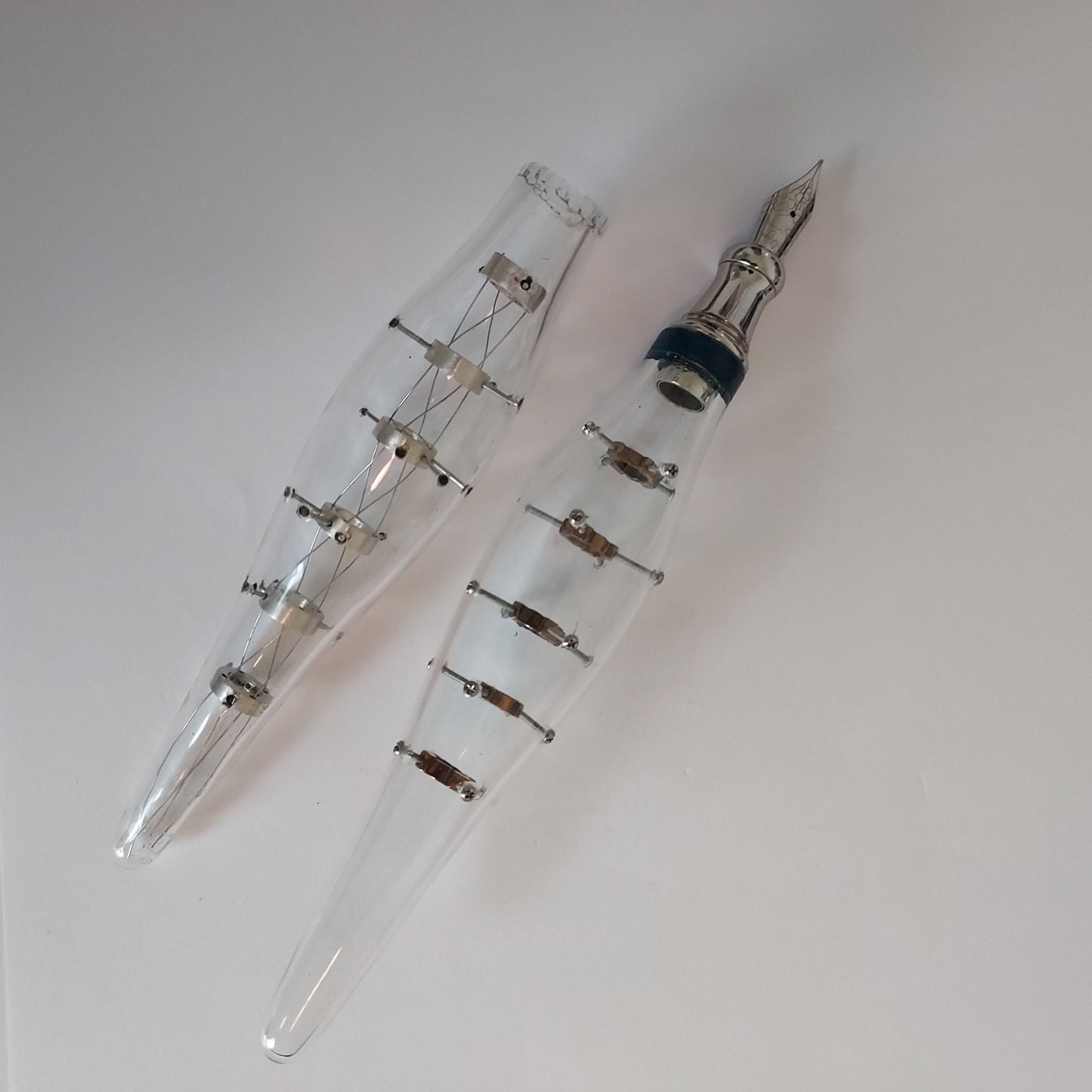 Riveted suspension Glass pens